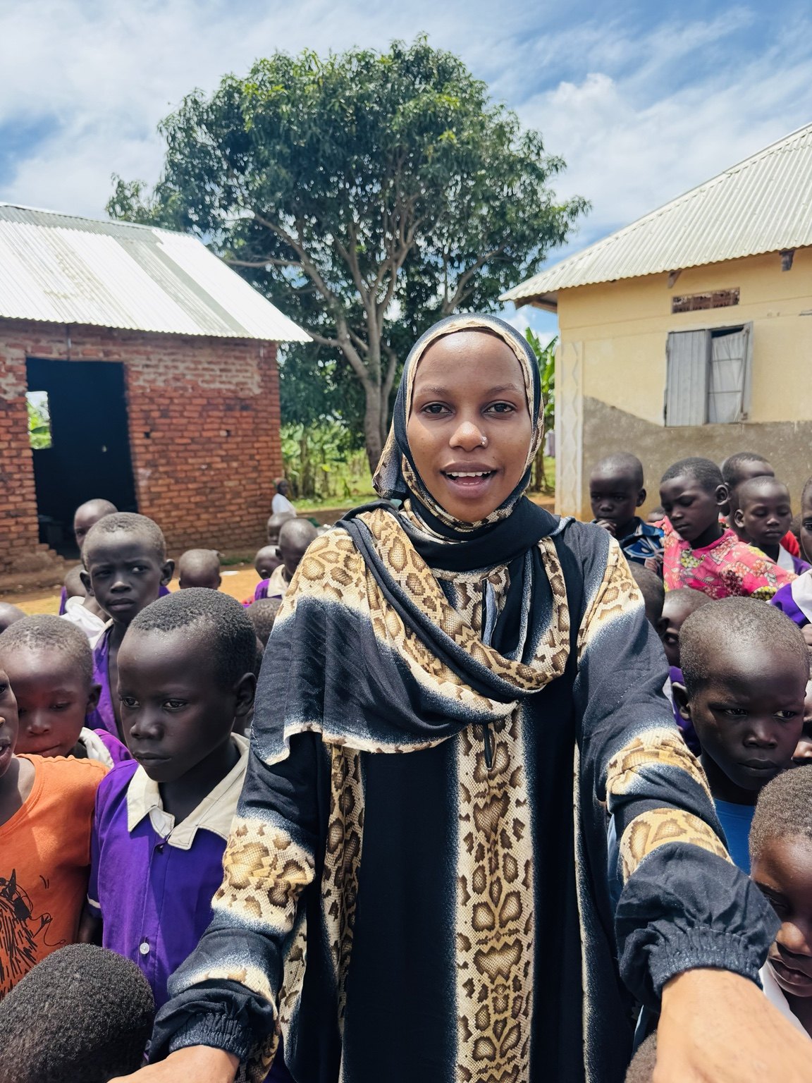 Community caregiver with children