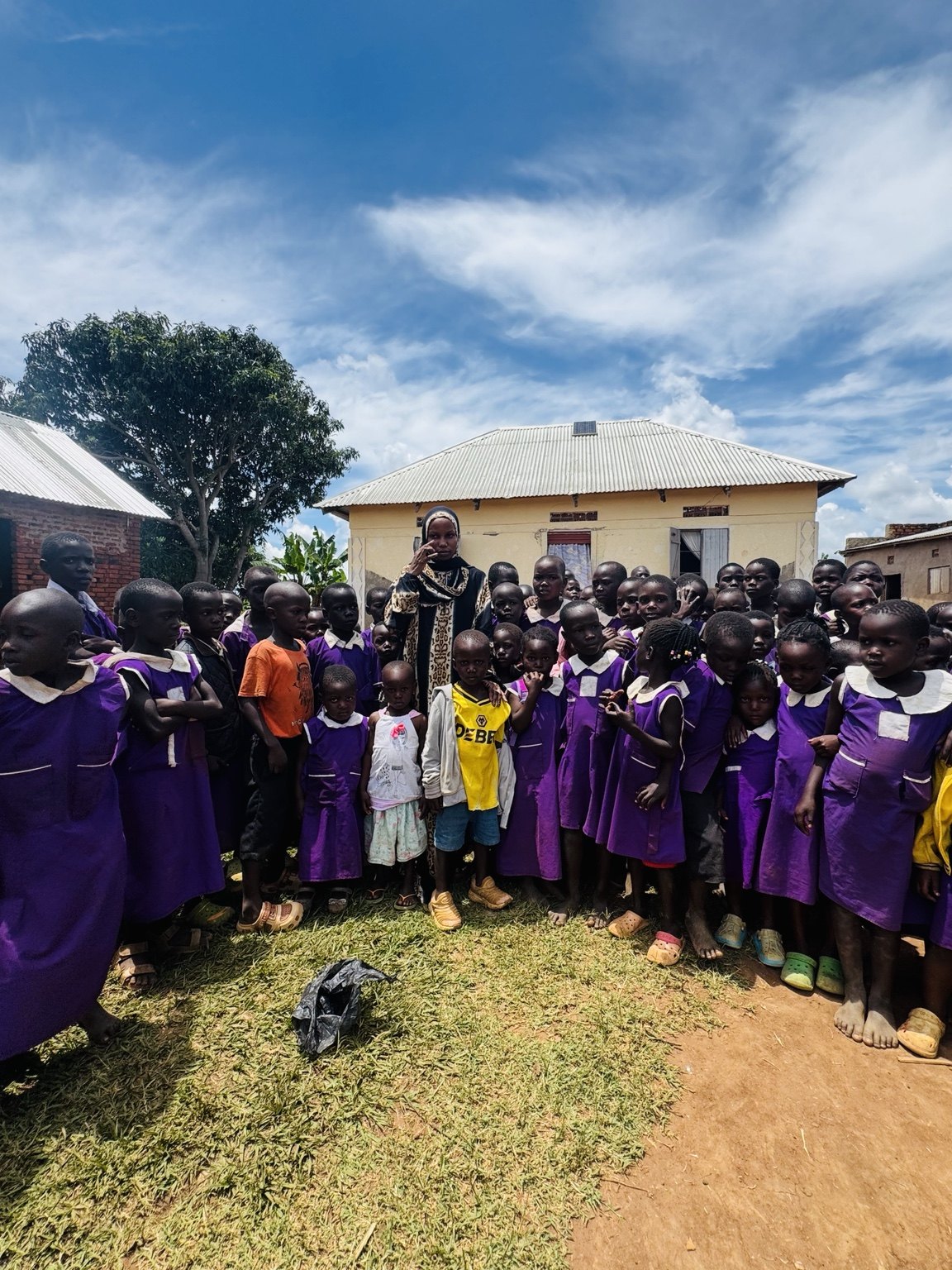 Schoolchildren gathered outdoors