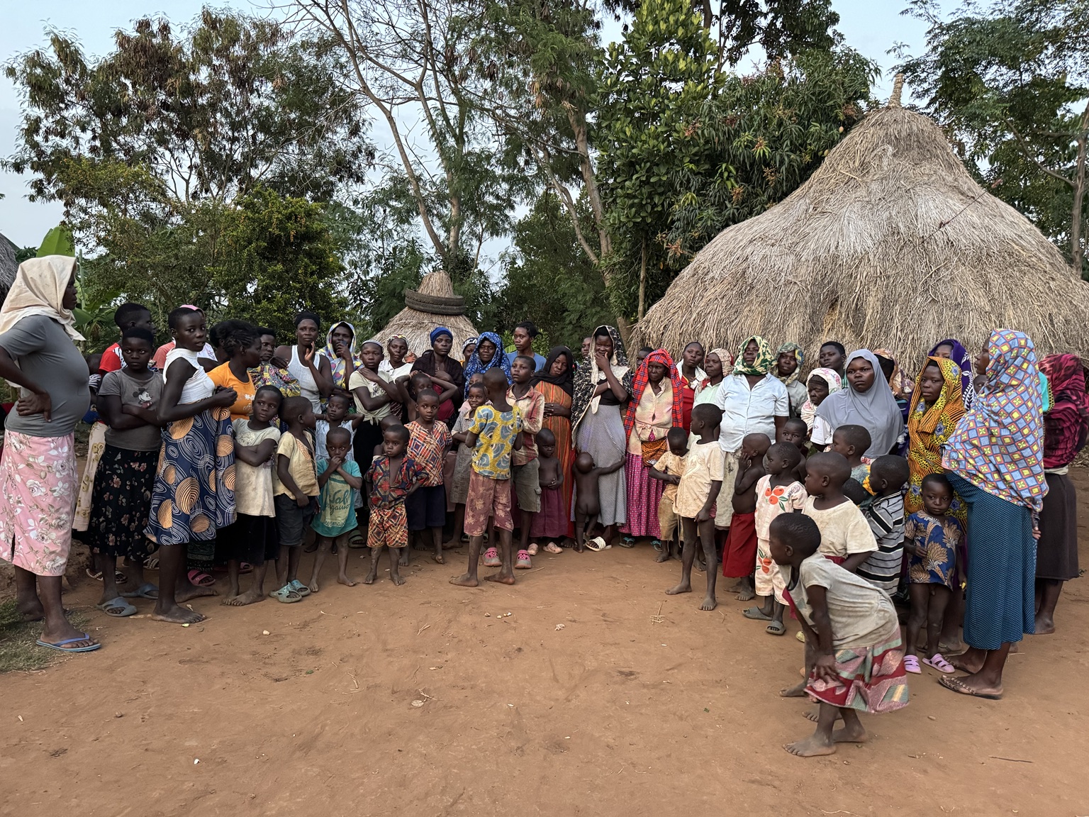 Children and community members gathered at the orphanage project