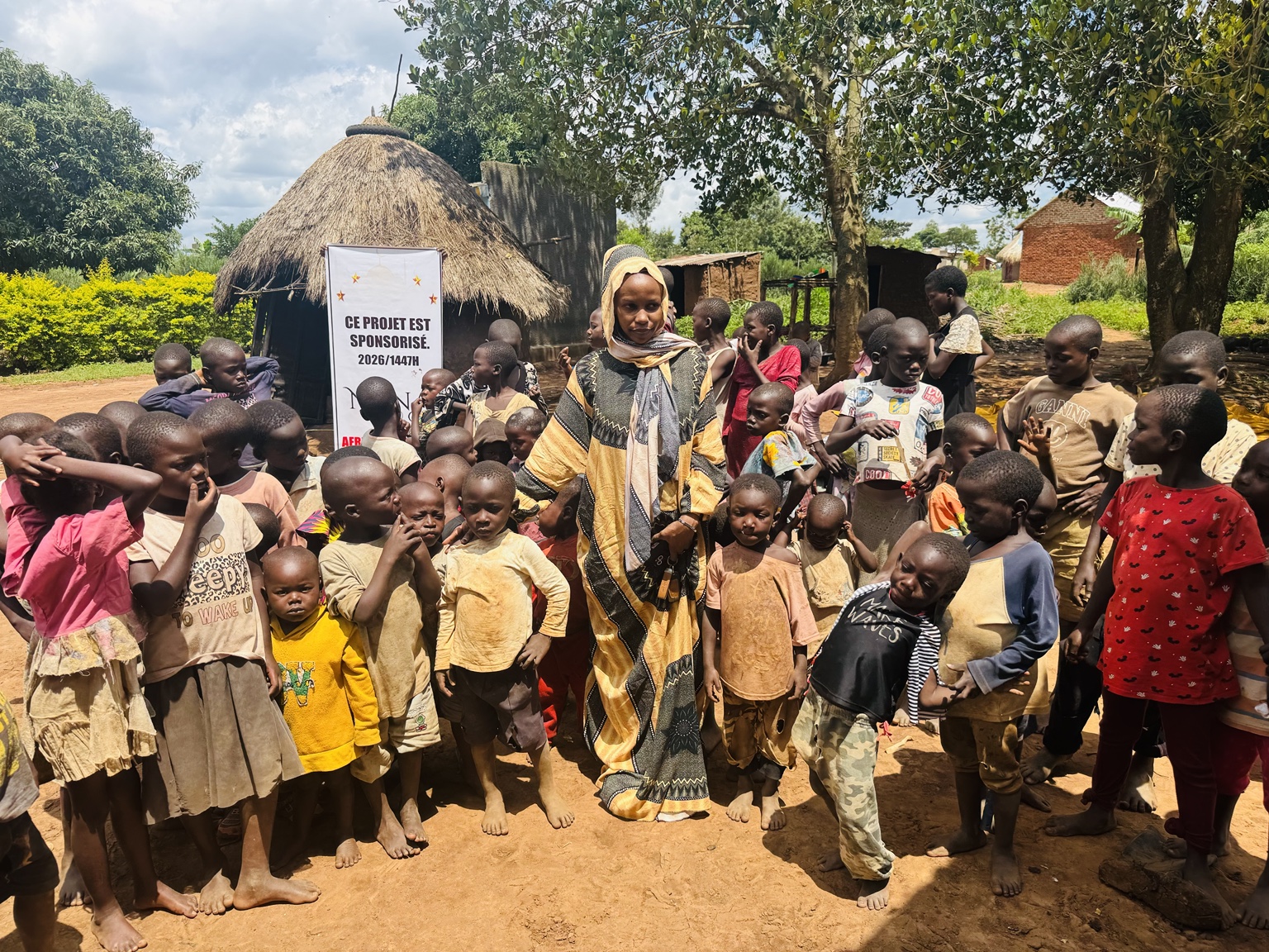 Fatimah Initiative team with children in the community