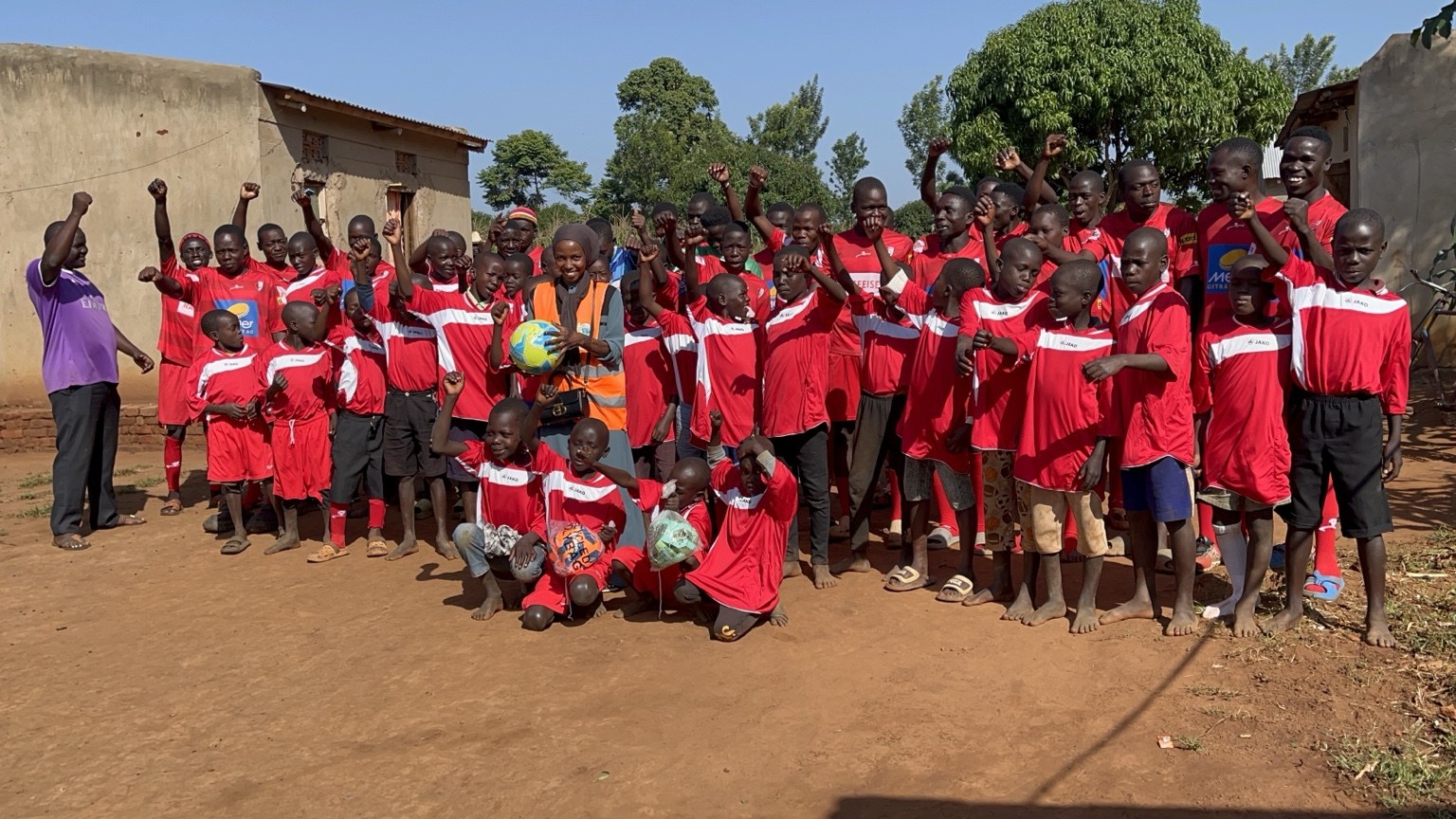 Orphans football team gathered together